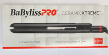 Load image into Gallery viewer, Babyliss Pro Flat Iron. One inch ceramic floating plates, dual voltage, has on/off button, heats up to 450 degrees F. Features temperature control and a 8 foot cord that swivels to avoid the cord from tangling.   Ceramic is a natural source of far-infrared heat that provides superb styling results.
