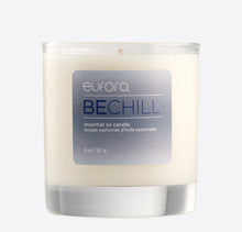 Load image into Gallery viewer, Eufora Be Chill Candle. Infuse the air with hints of vanilla and clove leaf for a soothing attitude adjustment.  Masterfully crafted to conjure up the scent of a mood. Luxurious indulgent pure essential oil blends. Perfectly balanced in a natural wax blend of coconut and soy.  Hand-poured. Ignited by a cotton wick that ensures a clean burn. Up to 50 hours of total burn time. 
